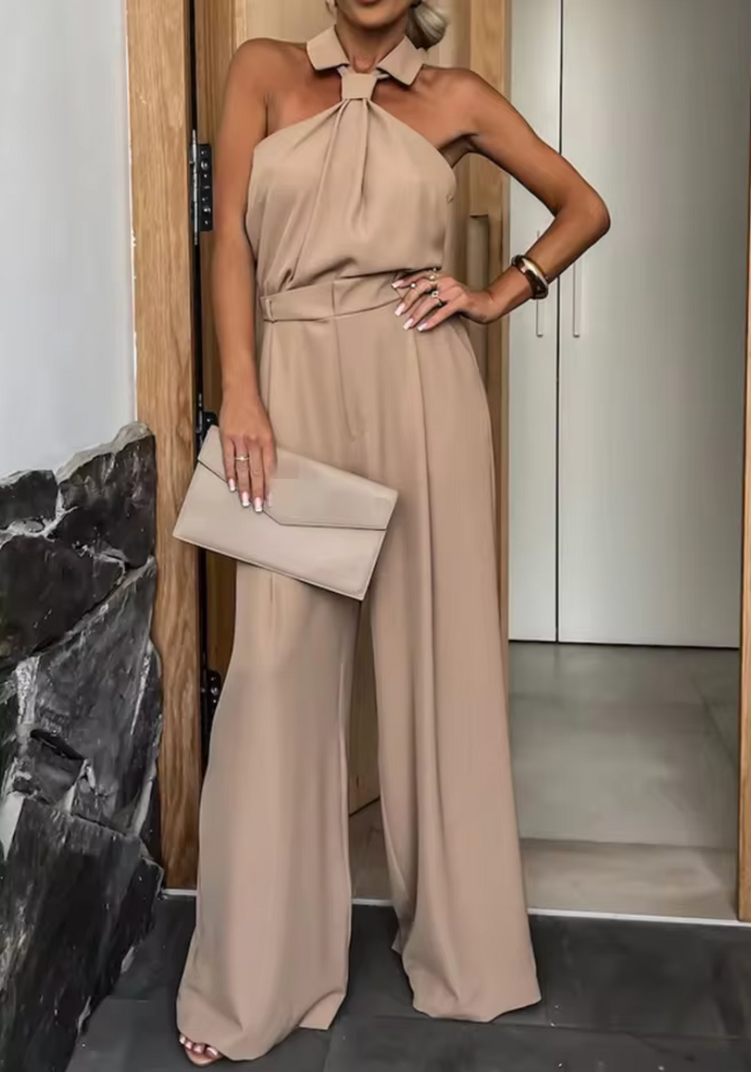 Stylish women's elegant jumpsuit with a flattering silhouette, perfect for effortless spring and summer fashion.