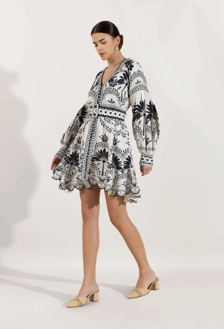 Elegant women's black mini dress for holidays & parties. Features puffed sleeves, V-neck, and a stylish belted waist.