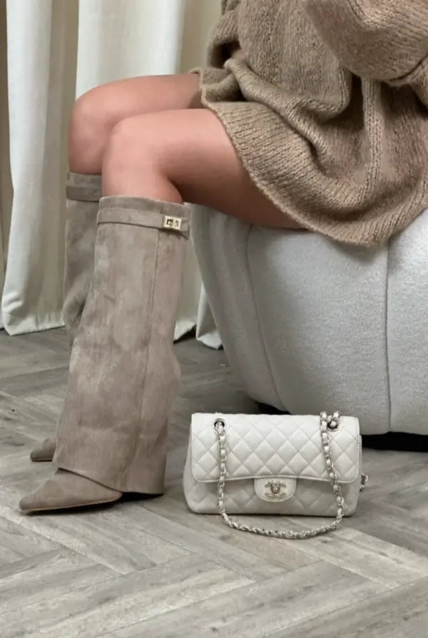 Elegant women's tall boots for fall fashion, combining sophistication with lasting comfort.