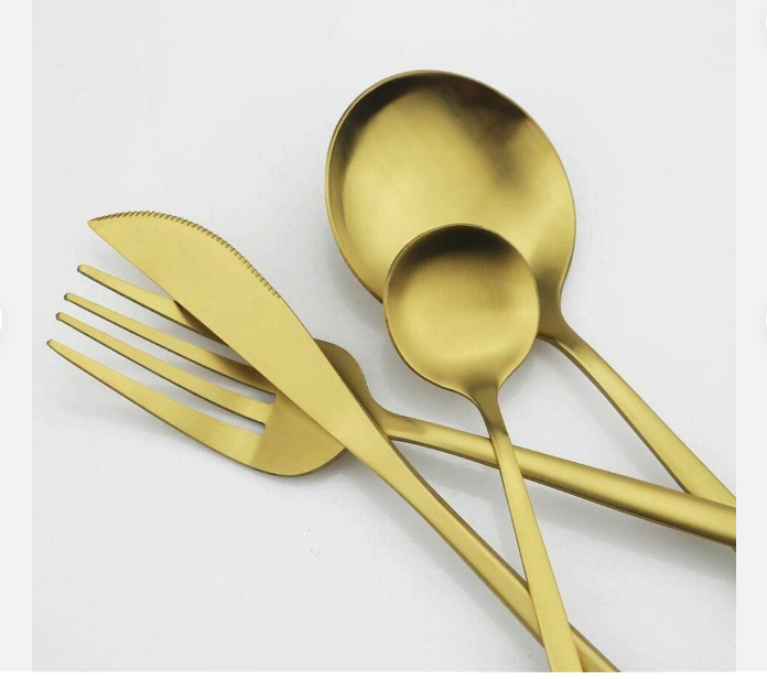 Luxurious gold cutlery set, a timeless addition to any modern kitchen.