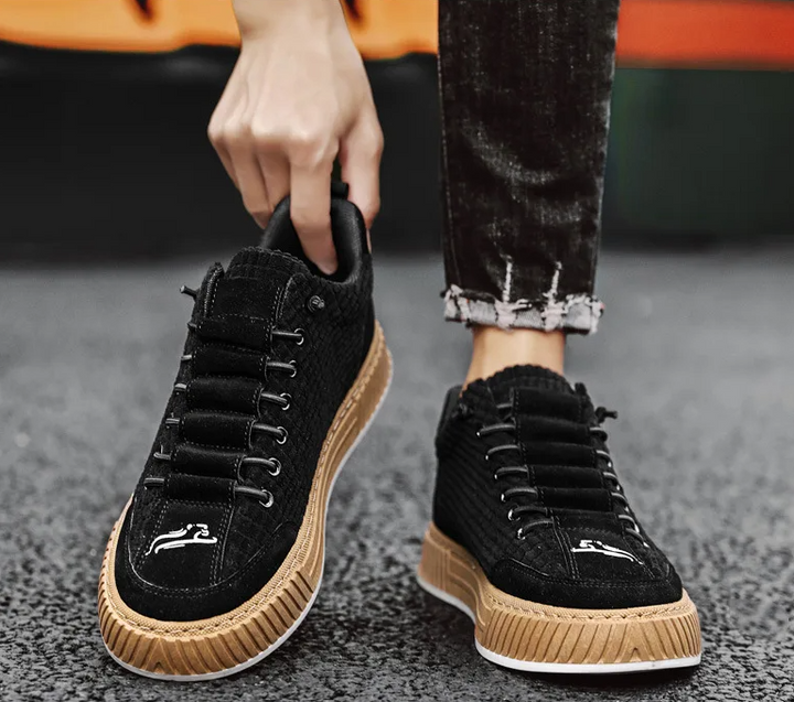 Men's stylish lace-up low top sneakers. Features quilted upper, comfortable cushioning, and durable sole.