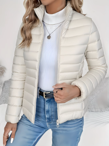 Chic women's lightweight quilted spring jacket featuring a fitted silhouette for versatile, casual elegance.