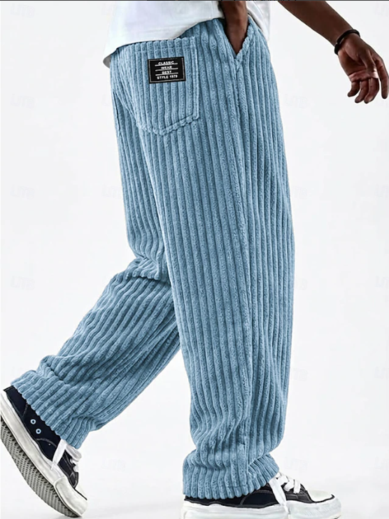 Men's classic corduroy pants in brown, comfortable for everyday wear, vintage style.