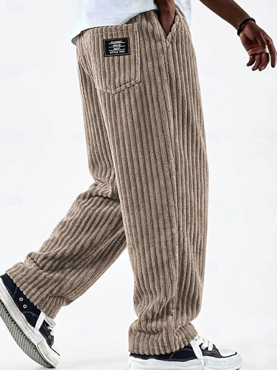 Stylish men's corduroy trousers, soft fabric, comfortable for casual and everyday outfits.