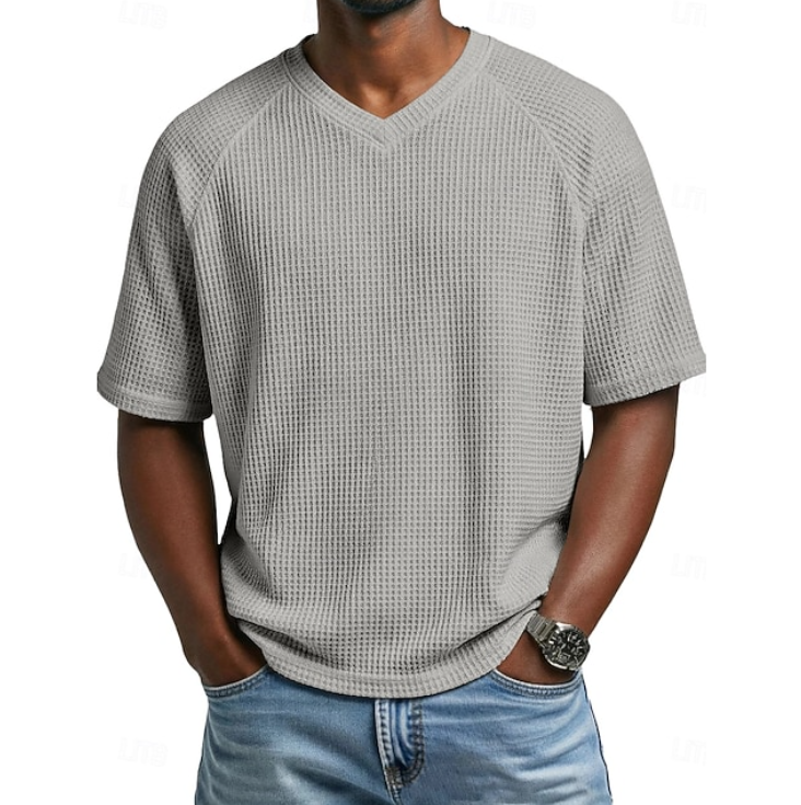Effortlessly stylish men's V-neck short sleeve shirt. Textured fabric offers a comfortable, versatile look.