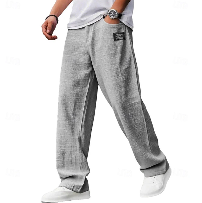 Close-up of the soft fabric on men's relaxed fit comfort pants, emphasizing quality and casual style.