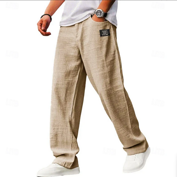 Man in stylish loose fit comfort trousers, perfect for versatile casual wear and daily activities.