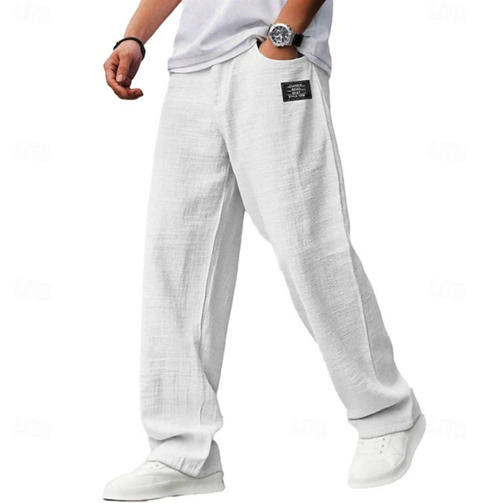 Assortment of men's casual loose fit comfort pants in various colors, offering versatile everyday options.