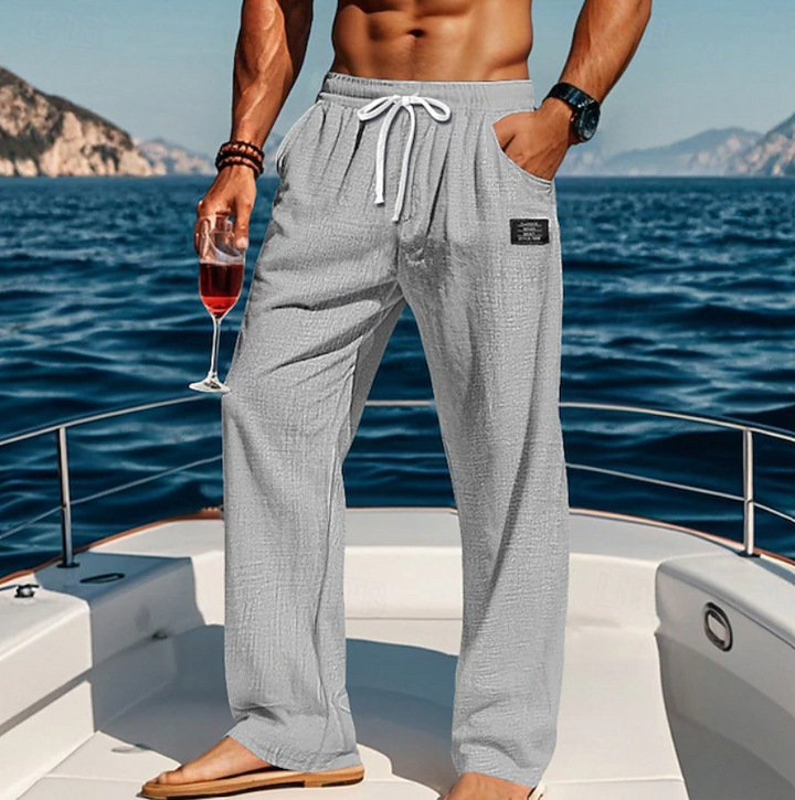 Comfortable men's summer drawstring trousers, designed for a relaxed, loose fit.