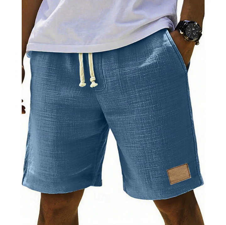 Essential men's relaxed fit shorts with elegant lace detail for warm weather. A comfortable and casual summer choice.