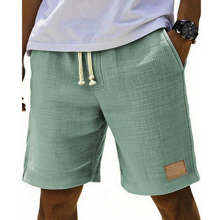 Man wearing classic summer lace shorts, demonstrating the relaxed fit and casual style for warm weather.