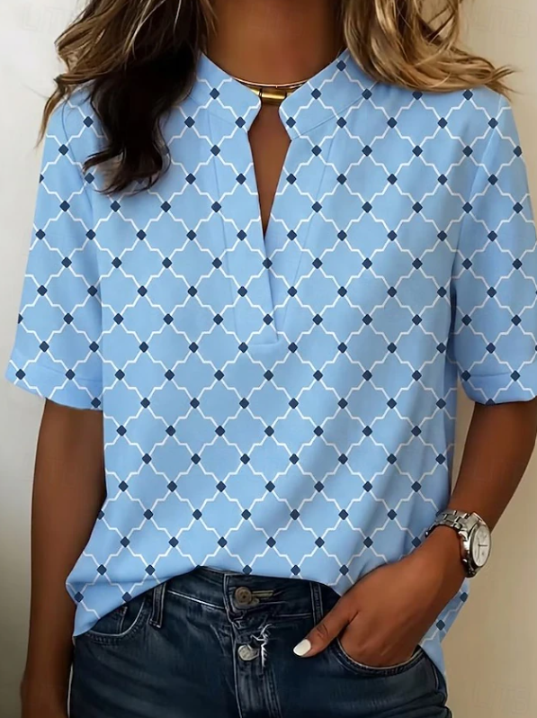 Stylish women's Mila geometric print Henley blouse; a comfortable, vibrant top for versatile wear.