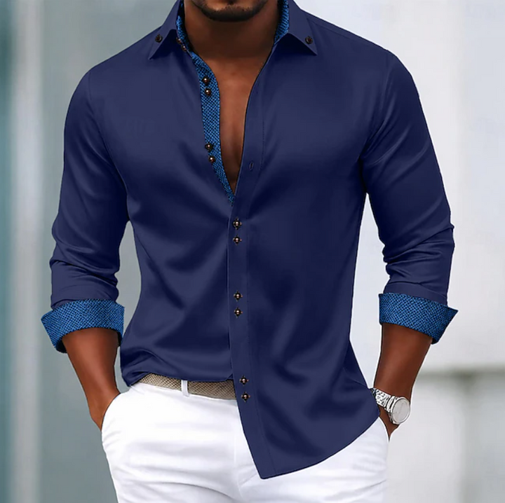 Long sleeve men's collared shirt with a classic design. Essential everyday wear for a sophisticated wardrobe.