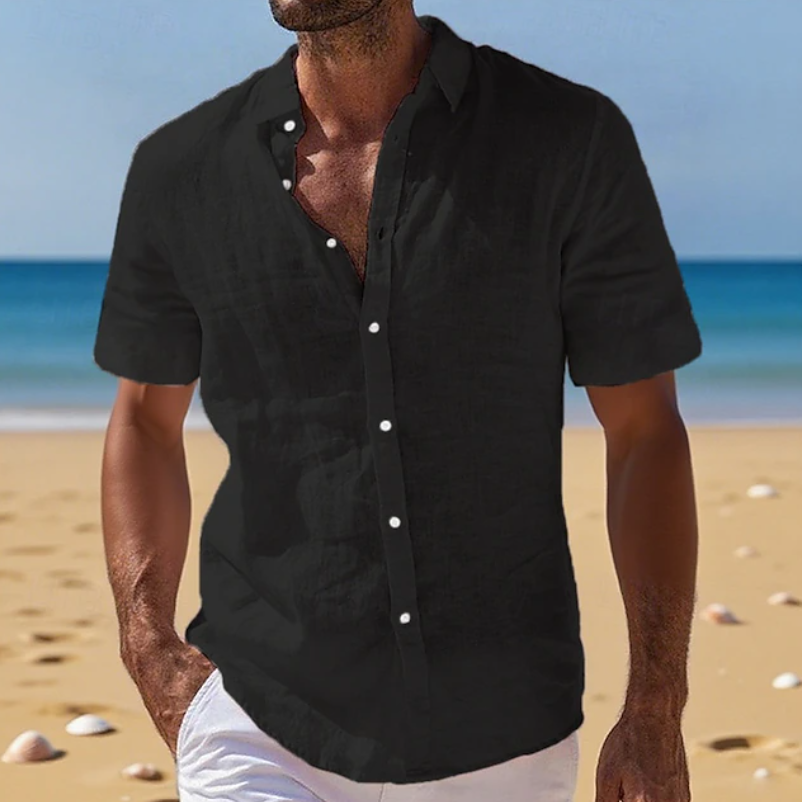 Stylish men's short sleeve summer shirt with a relaxed fit, ideal for beach trips & casual outings.