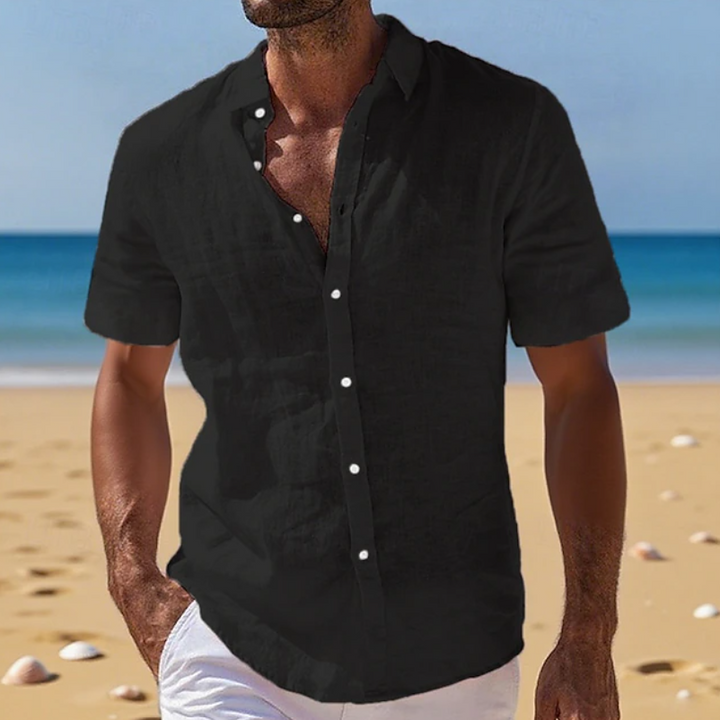 Stylish men's short sleeve summer shirt with a relaxed fit, ideal for beach trips & casual outings.