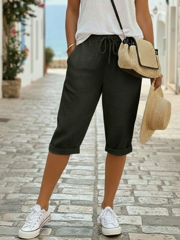 Stylish men's relaxed fit Bermuda shorts. Knee-length casual wear for everyday summer comfort.