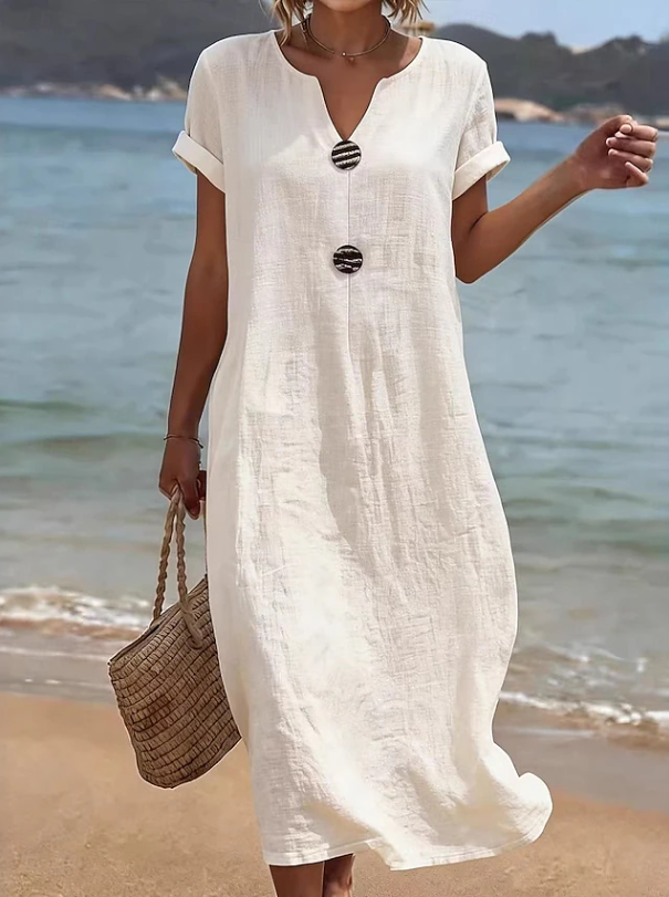 Casual women's long button beach dress. A lightweight, flowy maxi perfect for resort or summer daytime.