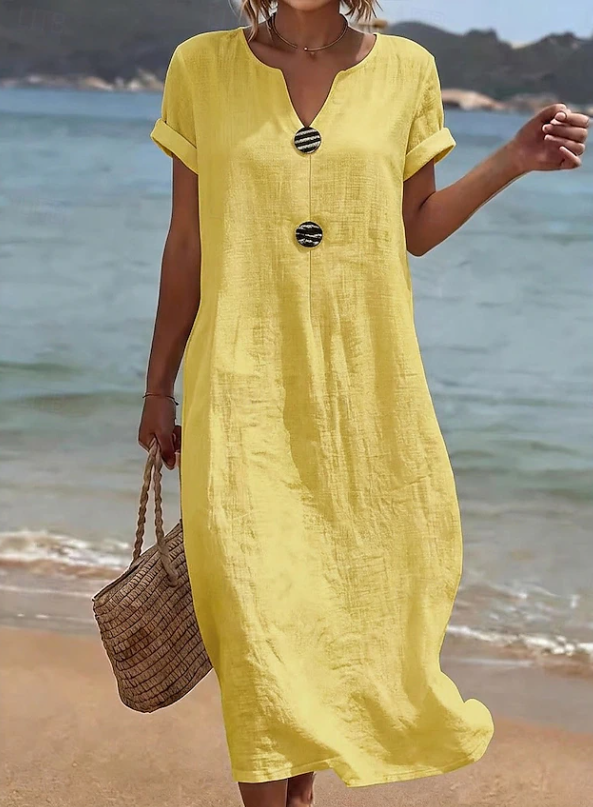 Flowy women's long button-down beach maxi dress. Lightweight, comfortable & stylish for summer vacations.