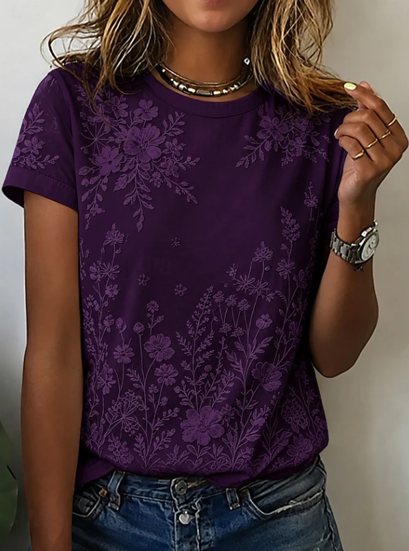 Women's casual floral short-sleeve blouse with a relaxed fit, perfect for everyday summer style and comfort.