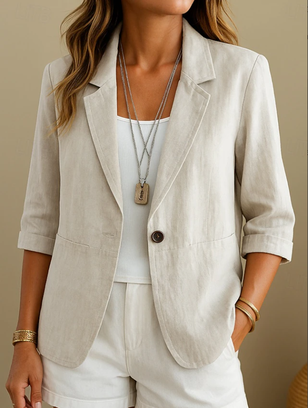 Chic pink women's tailored blazer, perfect for adding a pop of color to smart casual outfits or professional everyday wear.