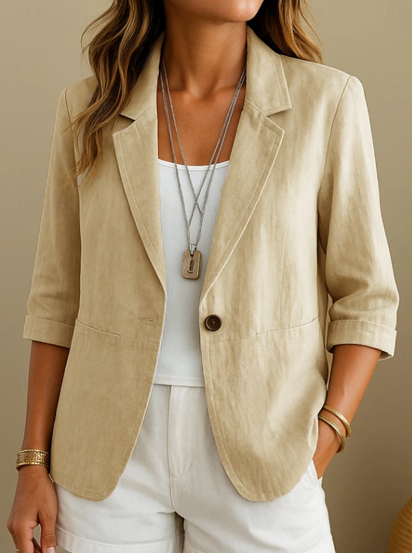 Stylish grey tailored women's blazer, ideal for professional office style, business casual, or elegant everyday outerwear.