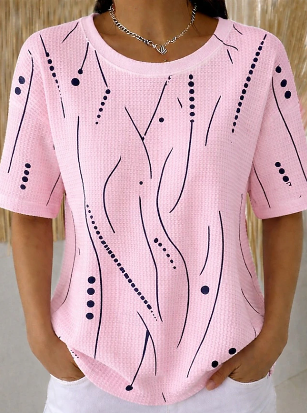 Comfortable women's short sleeve top with unique textured wave design. Everyday casual blouse in a relaxed fit.