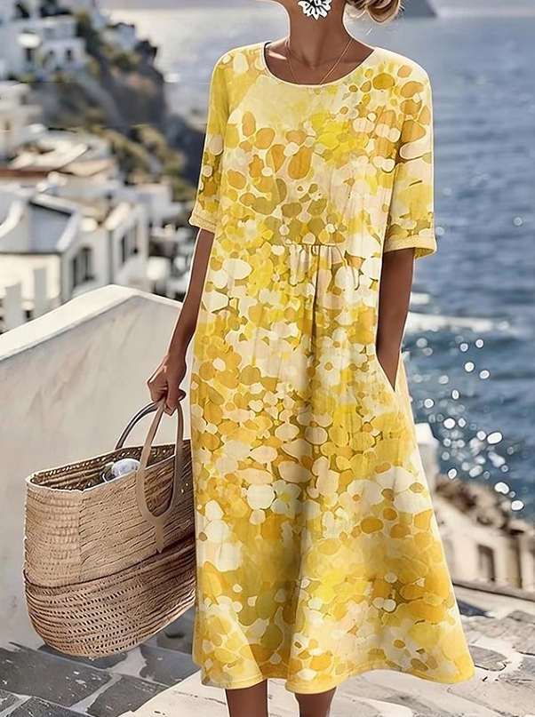 Effortless elegant women's floral boho maxi dress, a perfect casual summer fashion statement for beach or vacation.