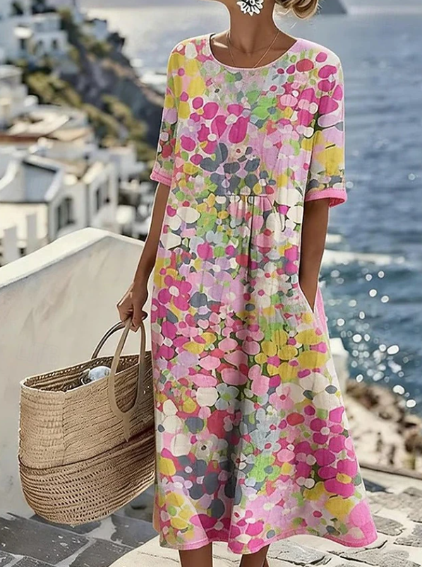 Women's floral printed maxi dress in a casual boho style, ideal for summer, vacation wear, and effortless elegance.