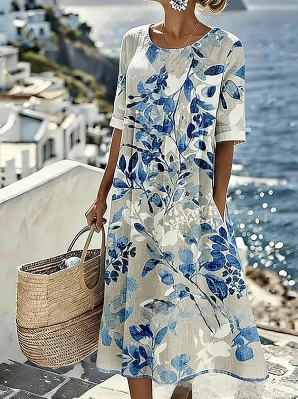 Flowy women's casual floral maxi dress for summer fashion, a comfortable boho printed dress perfect for beach vacation.