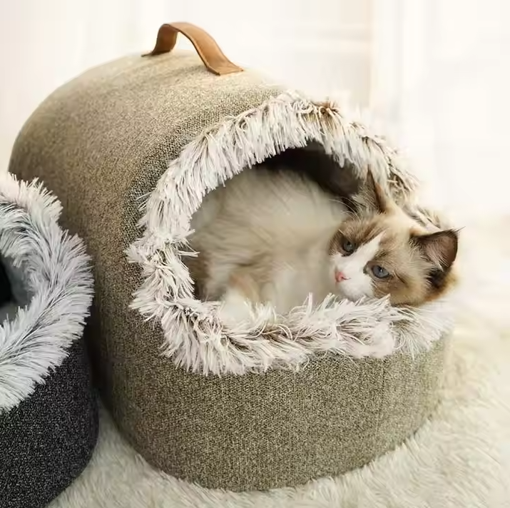 Cozy cat house bed with a soft, fluffy edge, perfect for feline comfort & a warm pet retreat.