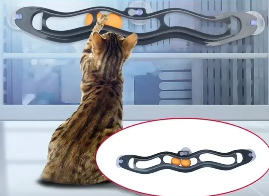 Engaging window cat toy with movable balls for interactive play, enrichment, & feline entertainment.