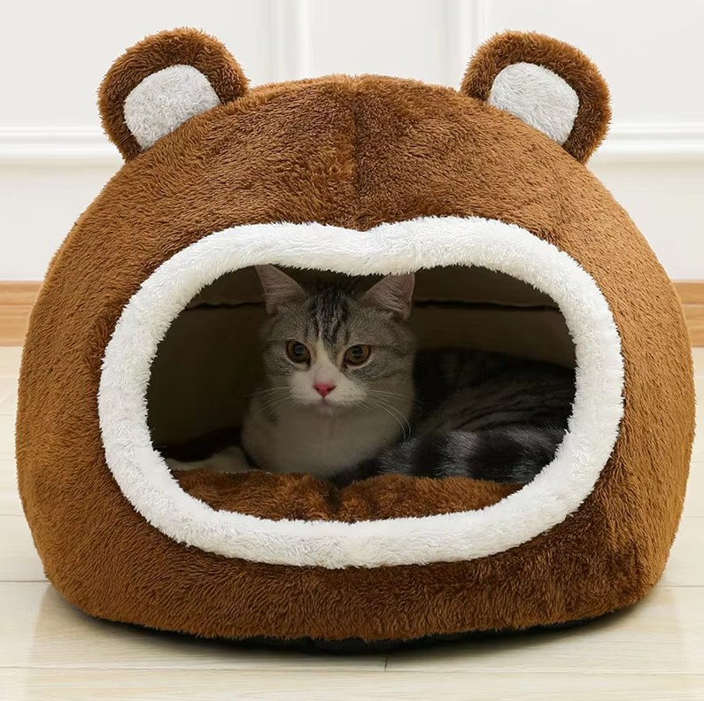 Fluffy cat cave bed in a cozy bear design, perfect for feline comfort and deep sleep.