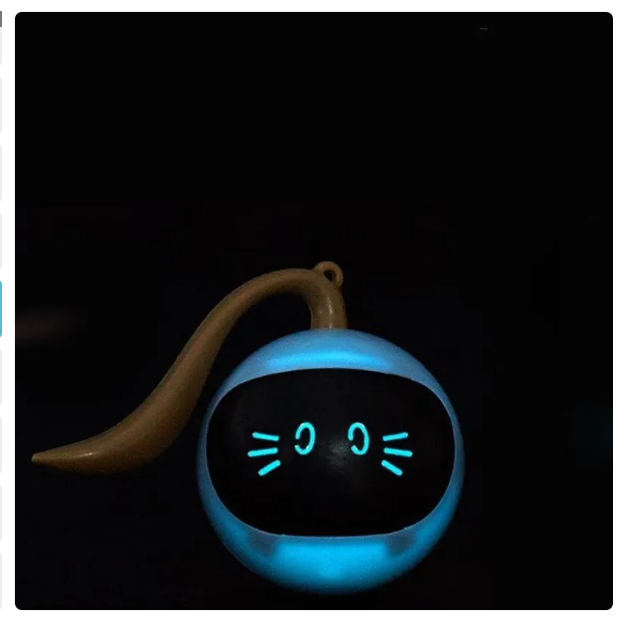 A black cat playing with the Smart LED interactive toy ball, promoting active feline exercise.