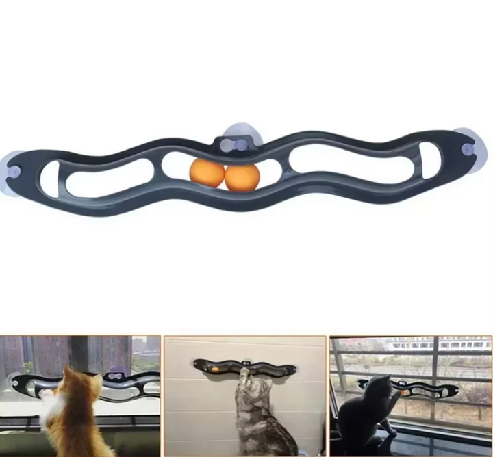 Secure suction cup cat toy for windows, offering interactive play with movable balls for active cats.