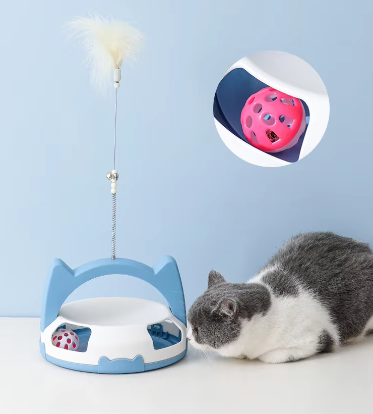 Indoor cat enrichment toy: rolling ball track with a playful feather to keep felines actively entertained.
