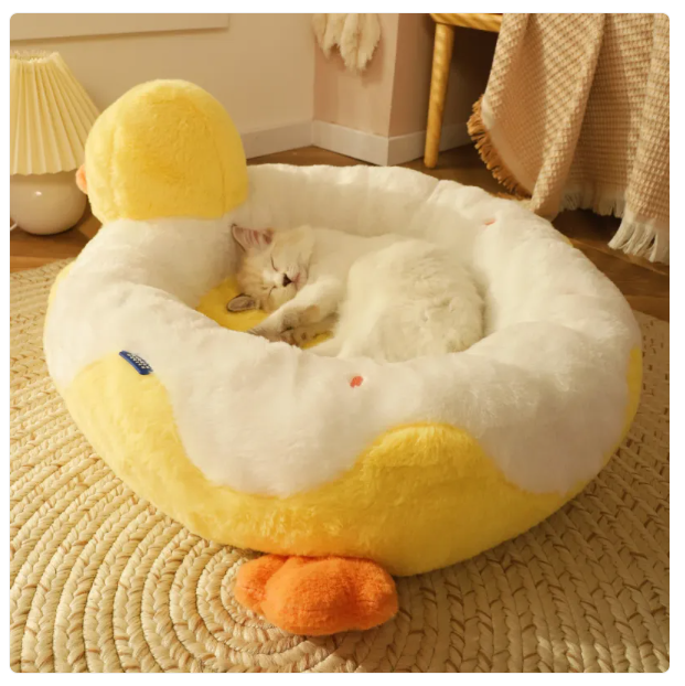 Cozy Duck Pet Bed: Ultra-soft, durable cat bed provides ultimate comfort for felines. Essential cat supplies.