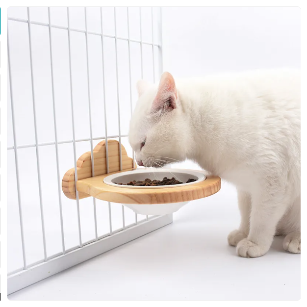 Stylish cat wall feeder with cloud design wooden frame. Elevated pet bowl saves space & promotes healthy eating.