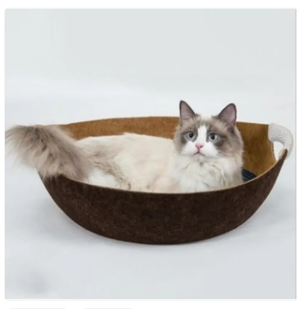 Chic felt pet bed basket, soft and cozy for cats, featuring sturdy easy-carry handles.