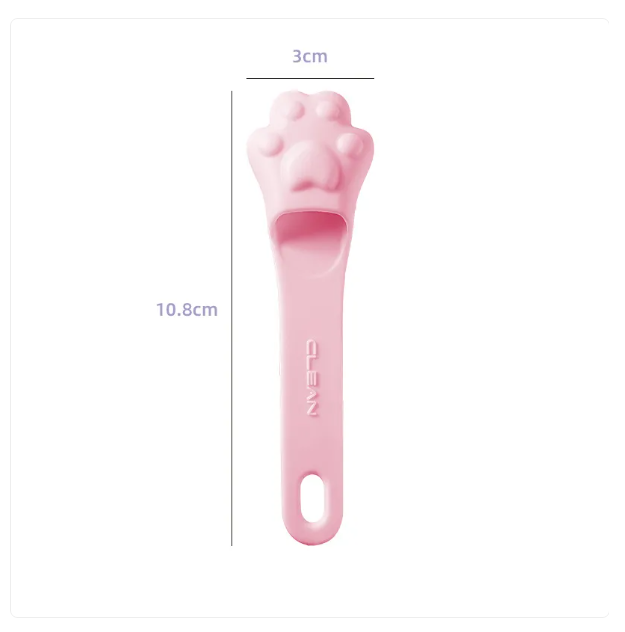Cute paw design dog tongue scraper, an essential tool for pet oral hygiene & fresh breath.