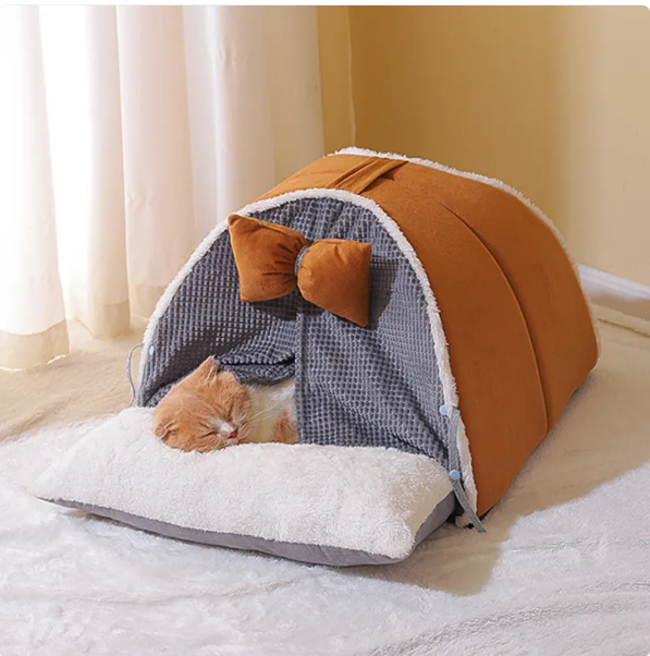 Cozy arch cat house with cute bow design. Perfect feline retreat, soft pet furniture for ultimate comfort.