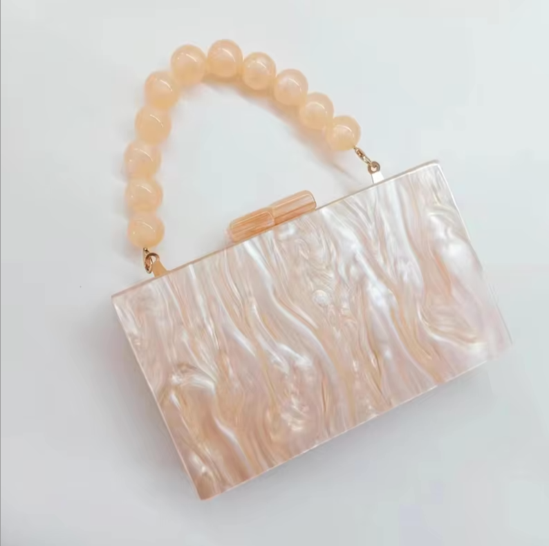 Timeless old money style acrylic clutch, women's elegant evening and party accessory.