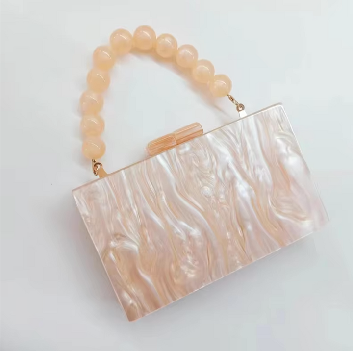 Timeless old money style acrylic clutch, women's elegant evening and party accessory.