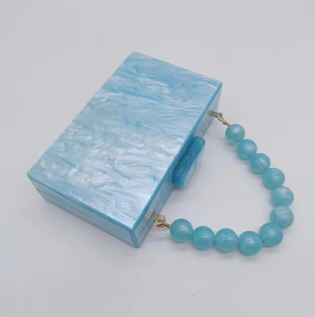 Elegant women's evening clutch bag, perfect for galas, formal dinners & parties.