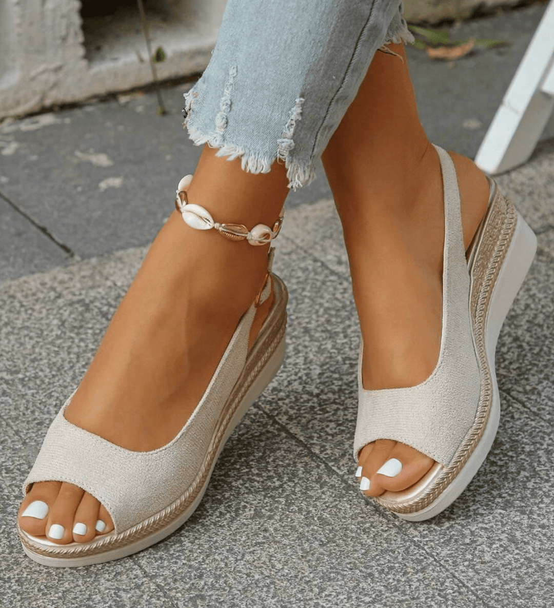 Classic black women's espadrille slingback sandals, orthopedic and chic for everyday summer comfort.