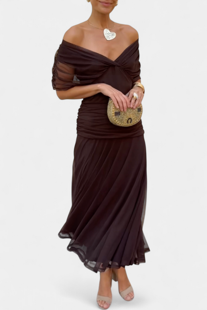Chic lace drape dress, perfect for weddings, cocktails & evening events. Elegant & flowy design.