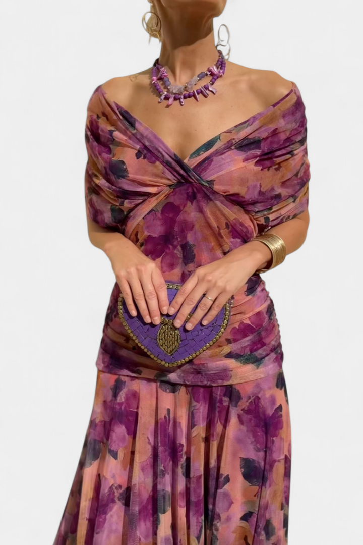 Flowy floral maxi dress for women, featuring a stylish V-neck. Ideal elegant summer attire.