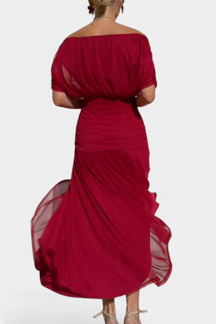 Women's elegant drape dress. Perfect for wedding guests, cocktails, or any formal occasion.