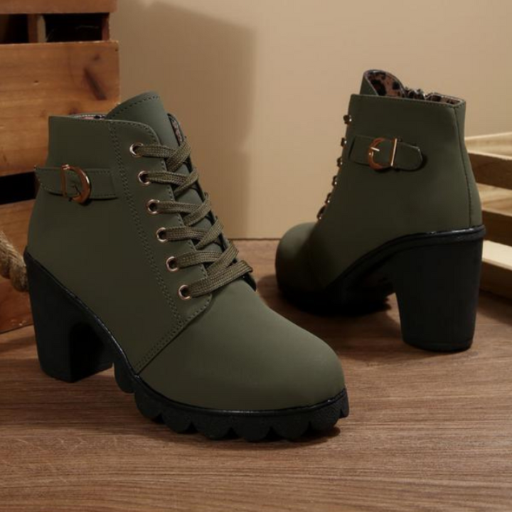 Fashionable women's ankle boots, lace-up design with a comfortable block heel. Perfect for winter and casual styling.
