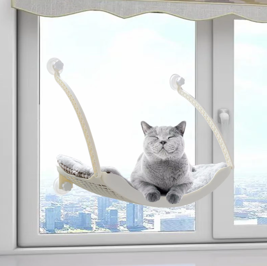 Premium pet supplies: stable cat window hammock, a cozy suction cup perch & elevated bed for cats.
