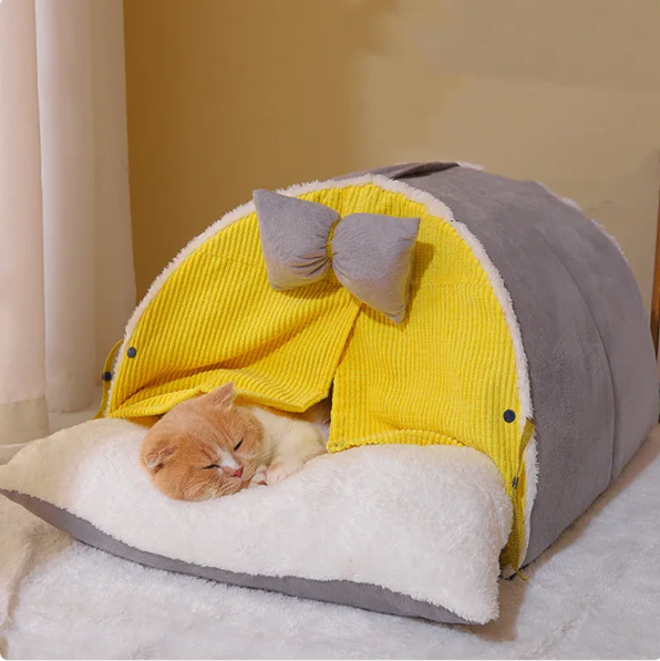 Washable arch cat bed with stylish bow. Provides a comfortable and cozy pet accessory for your feline.